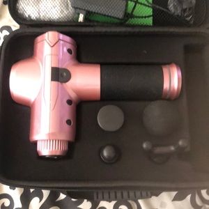Pink deep tissue massage gun